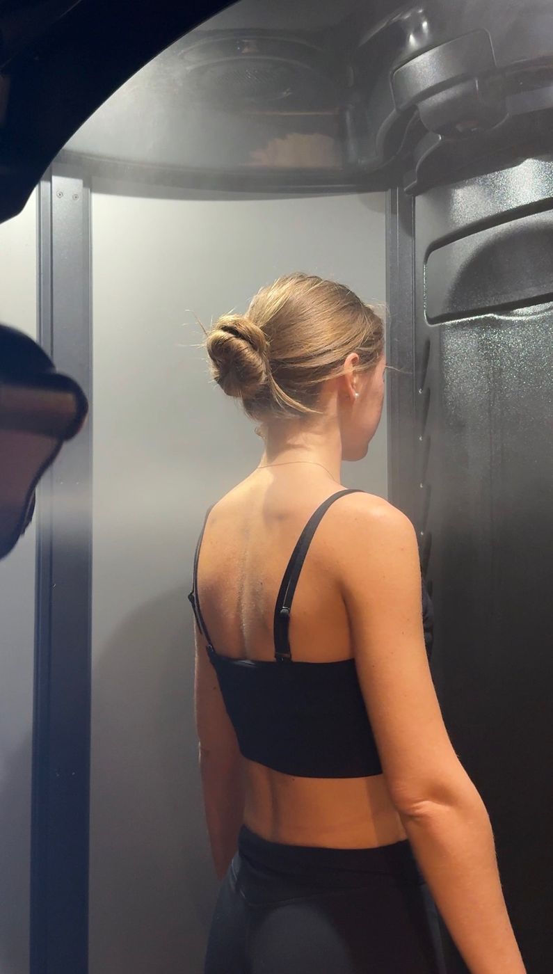 The fine-mist skincare treatment inside the WellFit booth